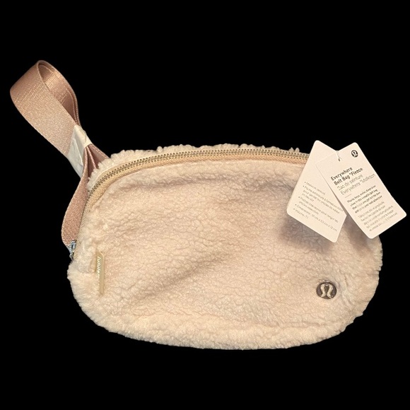 lululemon athletica Handbags - NWT, Lululemon sherpa belt bag (ivory/cream color)